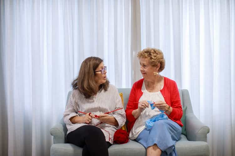 Women knitting at HammondCare's Social Club