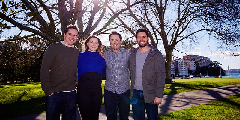 Lynette's children stand arm in arm together