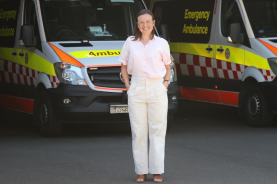 researcher-stands-in-front-of-ambulances-hammondcare