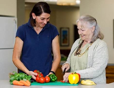 residential-care-hamondcare-carer-and-resident-prepare-food