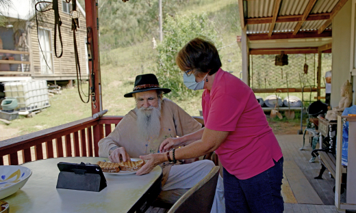 HCAR_Image-06_Laureen and John Serving Lunch_High Res_Retouched 2