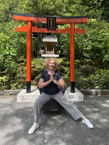 Cheryl practising chair yoga on a recent visit to Japan