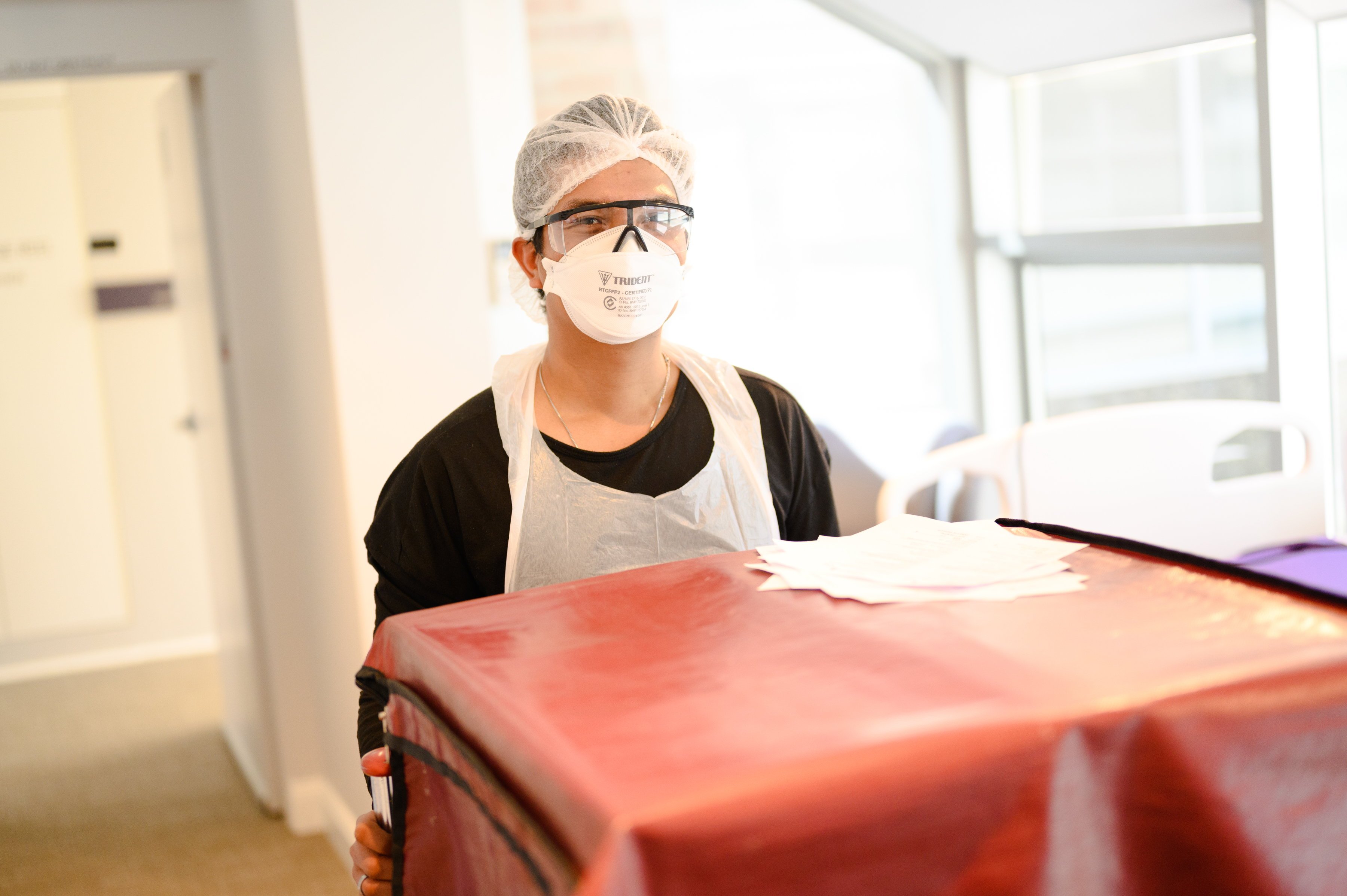 A person prepares a meal at HammondCare Neringah Hospital.